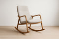 Rocking chair in wood and beige fabric