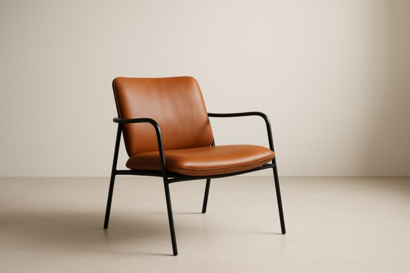 Armchair in brown metal and synthetic leather