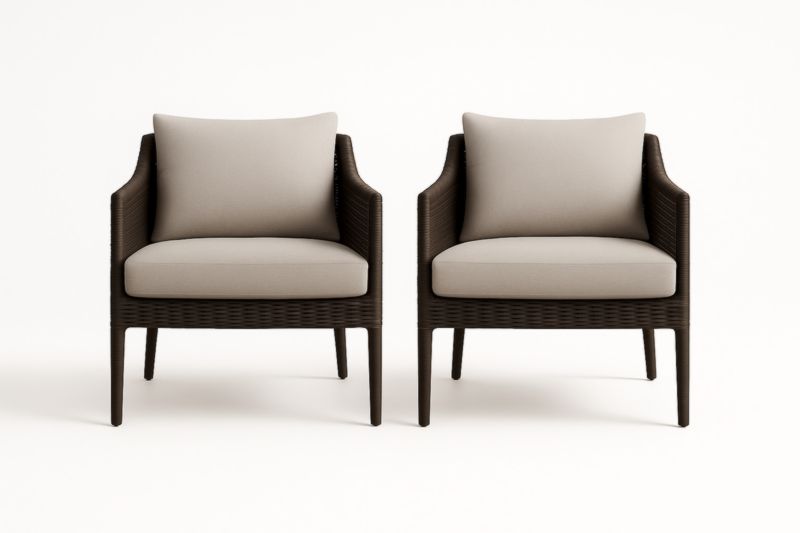 Pair of outdoor resin armchairs with polyester cushions