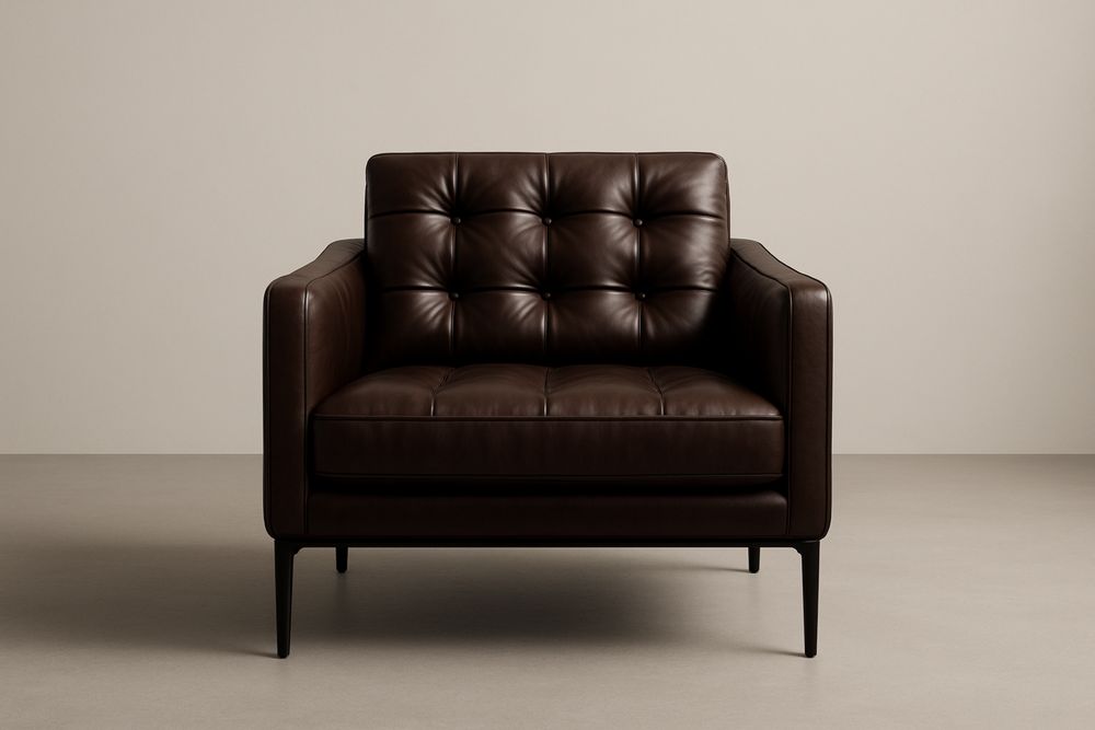 Brown leather armchair with steel legs